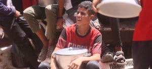 A boy in Gaza waits for food.